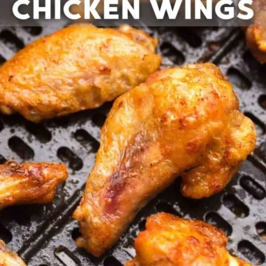 Delicious air fryer frozen chicken wings cooking in a basket