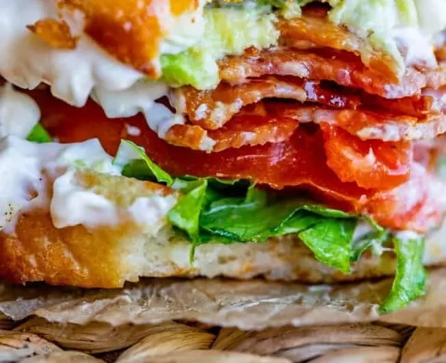 Delicious BLT sandwich with crispy bacon, fresh lettuce, and ripe tomatoes