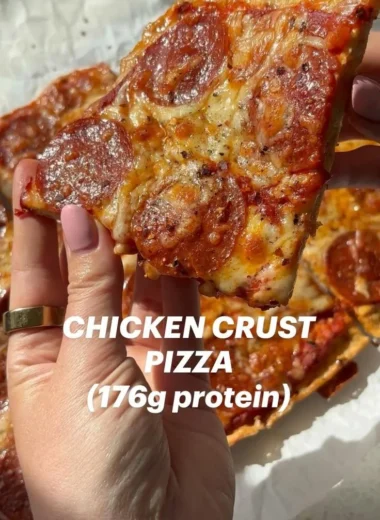 Chicken crust pizza topped with fresh ingredients and melted cheese