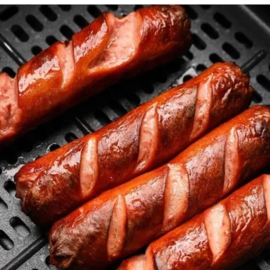 Easy air fryer hot dogs cooked to perfection with a crispy exterior and juicy inside