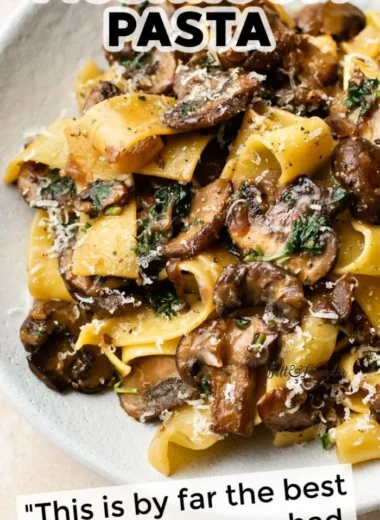 Delicious garlic mushroom pasta dish served in a bowl with herbs