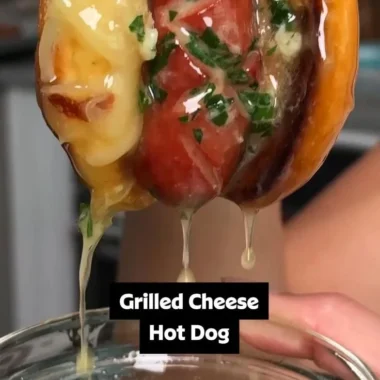 Delicious garlic butter grilled cheese hot dogs served on a plate.