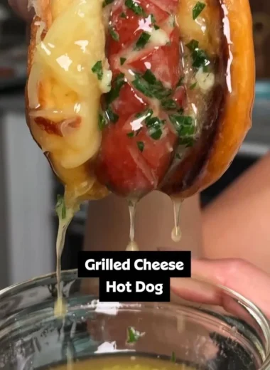Delicious garlic butter grilled cheese hot dogs served on a plate.