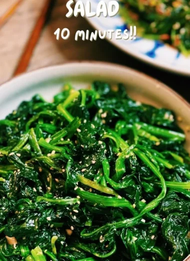 Korean Spinach Salad (Sigeumchi Namul) served in a bowl with sesame seeds