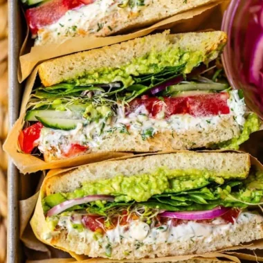 Laura's Amazing Fresh Veggie Sandwich with colorful vegetables and fresh ingredients