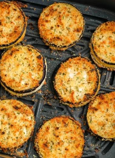 Delicious air fryer eggplant dish garnished with herbs