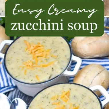 Creamy zucchini soup in a bowl garnished with fresh herbs