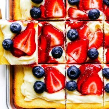 Delicious easy fruit pizza topped with fresh fruits and creamy frosting.
