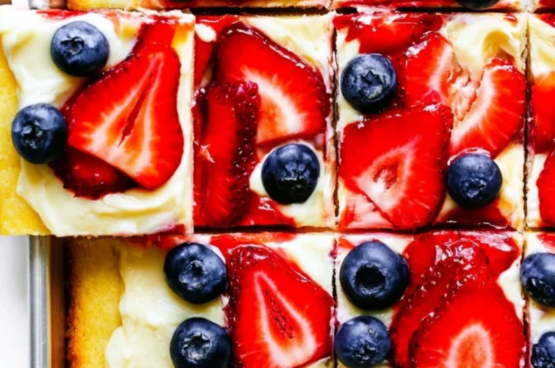 Delicious easy fruit pizza topped with fresh fruits and creamy frosting.