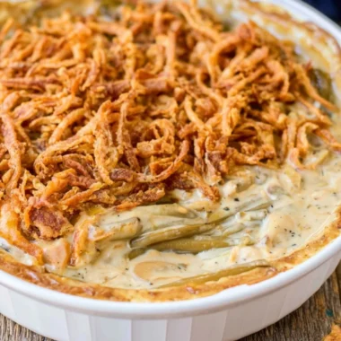 Delicious green bean casserole with crispy onion topping