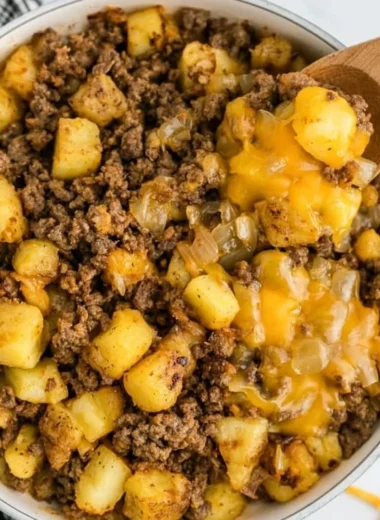 Delicious Hamburger Hash with ground beef and vegetables in a skillet