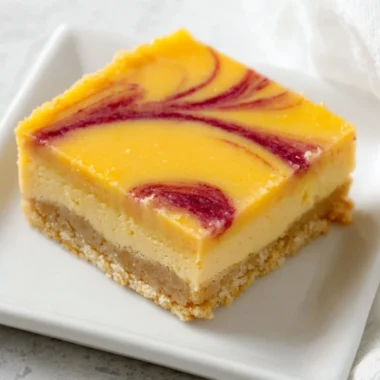 Deliciously creamy Mango Curd Bars with a golden crust and fresh mango topping