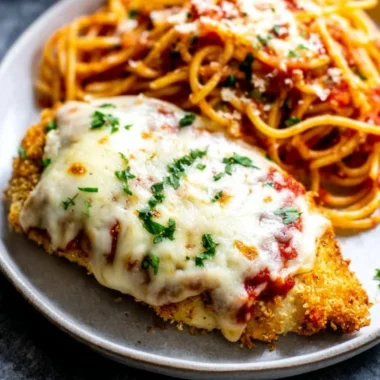Delicious oven baked chicken parmesan with cheese and marinara sauce