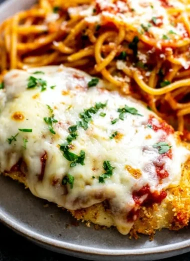 Delicious oven baked chicken parmesan with cheese and marinara sauce