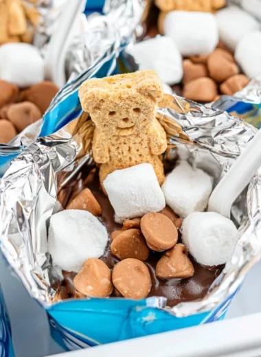 Delicious portable s'mores made with marshmallows, chocolate, and graham crackers.