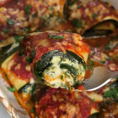 Delicious Zucchini Rollatini filled with cheese and herbs, a healthy recipe.