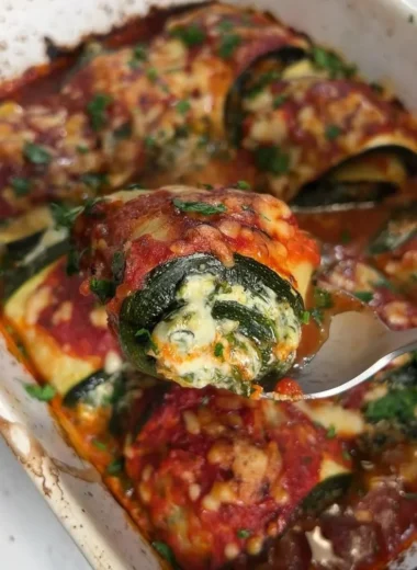 Delicious Zucchini Rollatini filled with cheese and herbs, a healthy recipe.