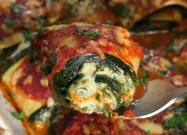 Delicious Zucchini Rollatini filled with cheese and herbs, a healthy recipe.