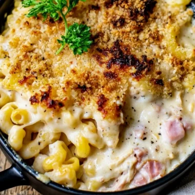 Cozy Chicken Cordon Bleu Casserole served in a baking dish with melted cheese.