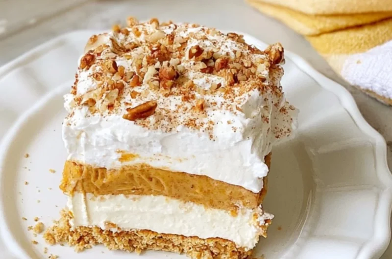 Delicious cozy pumpkin lush dessert with creamy layers and festive spices