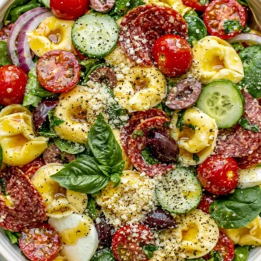 Cozy tortellini pasta salad with fresh vegetables and dressing