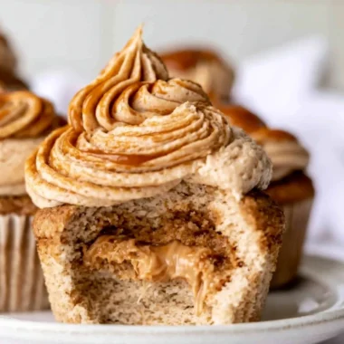 Delicious homemade dulce de leche cupcakes on a decorative platter
