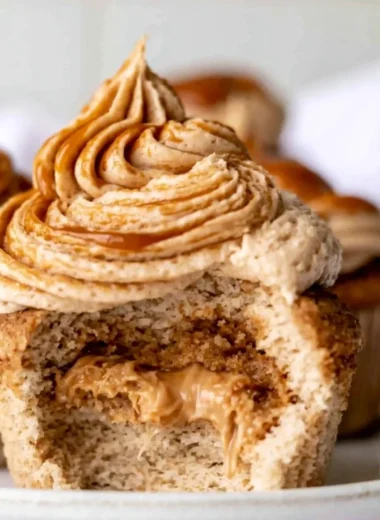 Delicious homemade dulce de leche cupcakes on a decorative platter