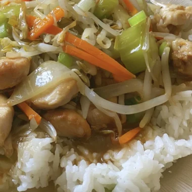 Cozy Cantonese Chicken Chow Mein with chicken, vegetables, and noodles in a bowl
