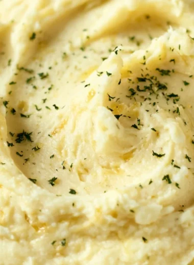 Cozy Garlic Mashed Potatoes Recipe served with butter and herbs